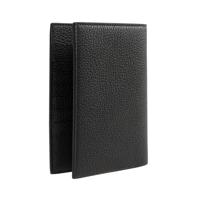 Image 2 of 3 - BLACK - TOM FORD Soft Grain Leather T Line Passport Holder featuring pebble-grained calfskin passport holder, gold-tone logo stamp at face, six card slots at interior, two passport slots and canvas lining. H5.75" x W4" x D1". Calfskin. Made in Italy. 