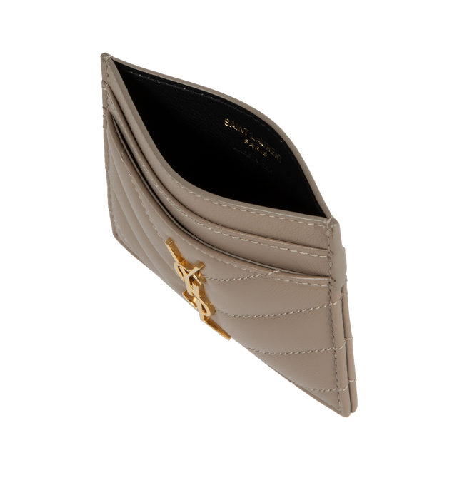 GREY - SAINT LAURENT Monogram Card Case featuring five card slots, gold tone hardware,the cassandre and chevron-quilted overstitching. 4 X 2.8 X 0.1 inches. 100% lambskin. Made in Italy. 