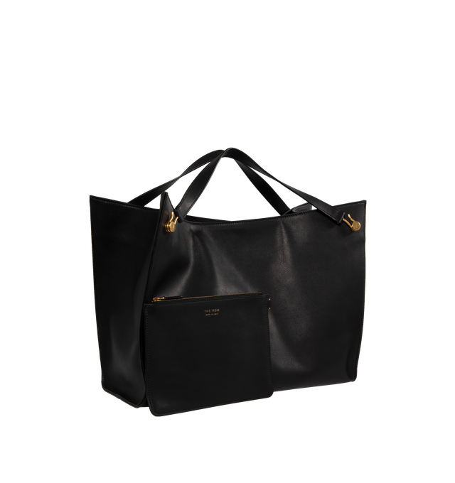 Image 2 of 3 - BLACK - THE ROW soft, deconstructed tote in polished saddle leather with interior tie closure, interior zip pocket, flat handles, and architectural draping to create volume. Measures 17 x 11.5 x 6 in. 100% Calfskin Leather lined in 100% Leather. Made in Italy. 