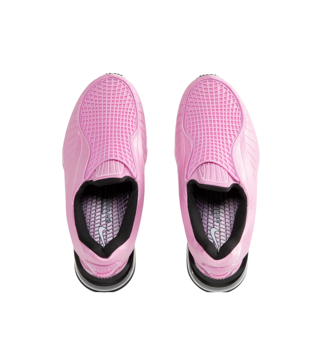 Image 5 of 5 - PINK - Nike Women's Air Max Dolce Shoes feature a laceless molded upper with an overlay cage and the distinctive Air Max silhouette. Designed for easy slip-on wear, the style is finished with visible Max Air cushioning in the heel for lightweight support and comfort. A foam midsole provides additional cushioning with every step. Midsole: Foam. Cushioning: Visible Max Air Unit. Closure: Slip-On.  