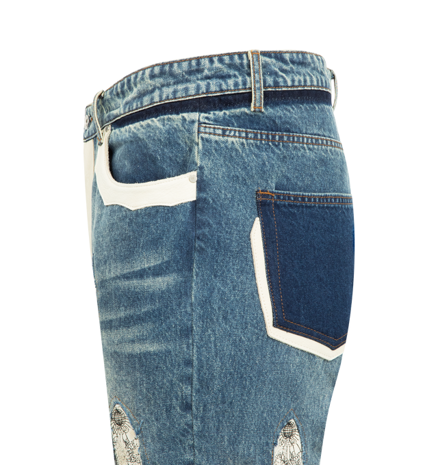 Image 3 of 3 - BLUE - WHO DECIDES WAR Howdy Denim featuring a slim straight fit, embellished with signature stained glass leather patches, patches embedded in the denim and accents follow on the inseam and pockets. 100% cotton. 