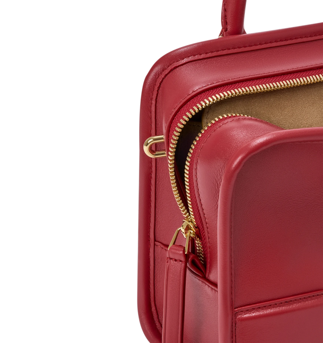 Image 16 of 18 - RED - Loewe Small Amazona 180 Bag in leather features a relaxed silhouette anchored by a single toron top handle, designed to be carried open, while a concealed closure secures the main compartment, three carry options: short handle, removable shoulder strap and crossbody, zip closure with two leather zip pullers, two compartments, main compartment closed with magnetic closure, internal flat pocket, left side d-ring for customization, nappa lambskin lining, and embossed double L branding. L 