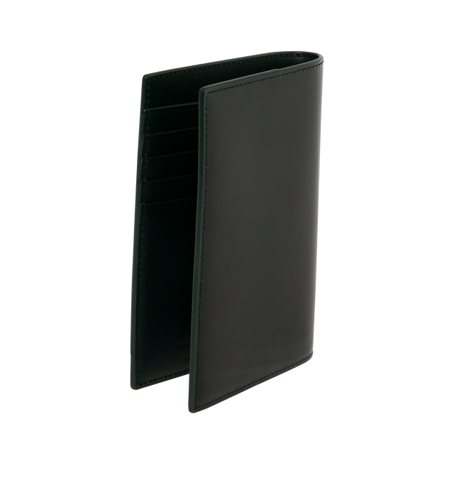 Image 2 of 3 - BLACK - SAINT LAURENT Passport Holder featuring two passport inserts, four card slots, leather lining and logo on front. 3.9 x 5.5 x 0.6 inches. Calfskin. Made in Italy. 