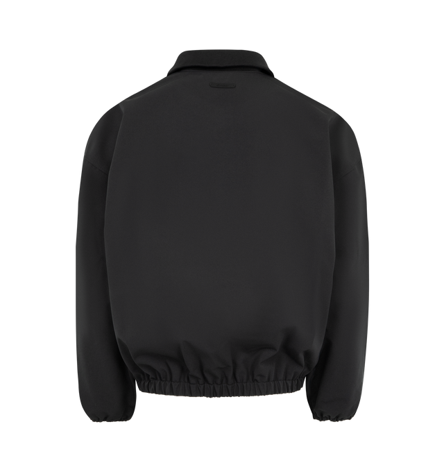 Image 2 of 3 - BLACK - FEAR OF GOD ESSENTIALS Signature Full Zip Track Jacket featuring stretch nylon taffeta, rib-knit stand collar, zip closure, logo embroidered at chest, seam pockets at waist, elasticized hem and cuffs, rubberized logo patch at back collar and full mesh lining. 90% nylon, 10% spandex. 