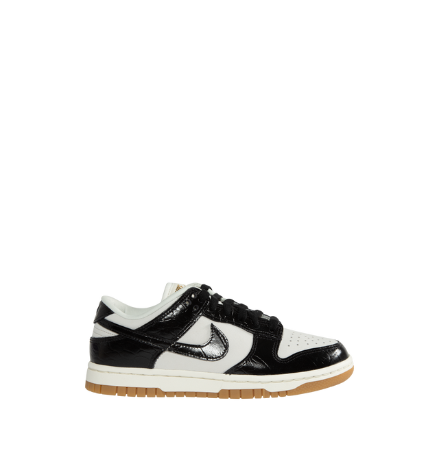 BLACK - NIKE Dunk Low LX Sneaker featuring lace-up front, signature Swooshes at sides, embossed Air logo at foxing, perforated toe and padded collar with debossed Nike logo at back counter.