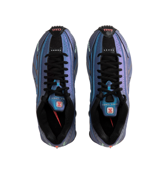 Image 5 of 5 - PURPLE - Nike Shox R4 featuring iridescent upper that shifts between shades of purple and blue. Featuring perforated detailing,  signature Shox pillars in the heel for enhanced impact protection, black accents on the laces and midsole. 