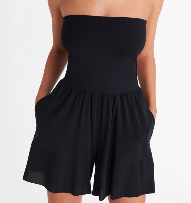 Image 5 of 6 - BLACK - ERES Lucia Shorts featuring side pockets with tone-on-tone stitching. Has versatile styling to also be worn as a bustier playsuit. Main: 94% Polyamid, 6% Spandex. Second: 84%  Polyamid, 16% Spandex. Made in France. 