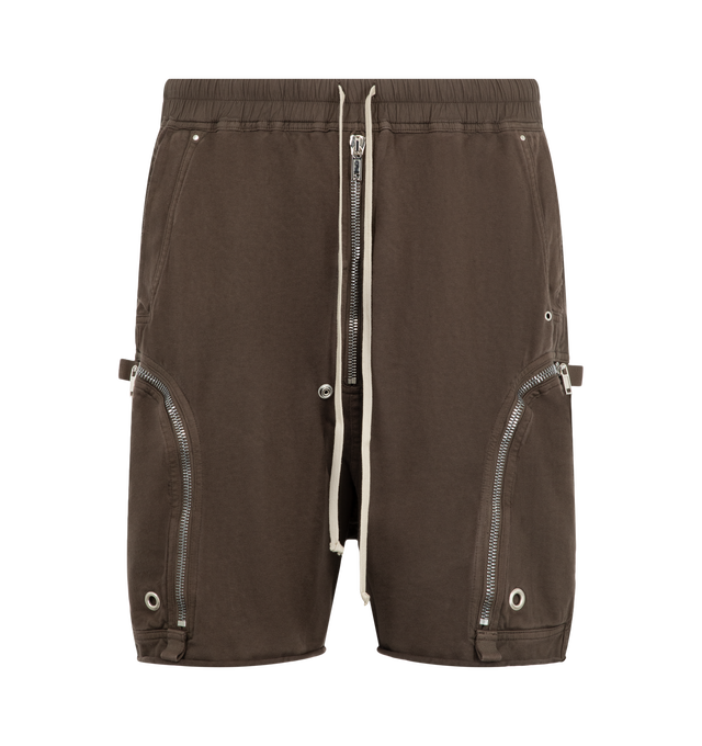 Image 1 of 3 - BROWN - Rick Owens DRKSHDW Men's Bauhaus Shorts are crafted from heavyweight garment-dyed cotton jersey with a soft brushed finish. Cut to a knee-length silhouette with a low dropped crotch, they feature an elasticized drawstring waistband, side pockets, signature Bauhaus zip pockets at the thighs, and back jet pockets. Webbing tab and eyelet details complete the utilitarian design. Main Material: 100% Cotton. 