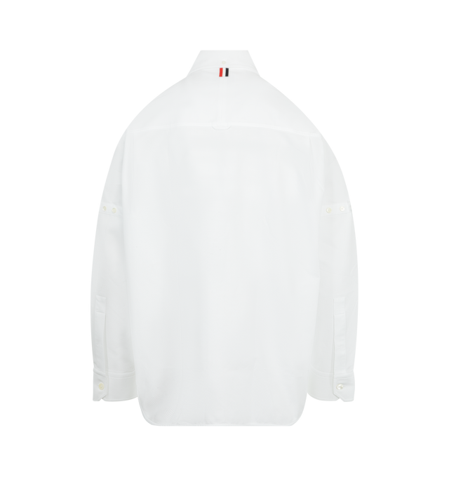Image 2 of 2 - WHITE - THOM BROWNE Opique Oversized Shirt featuring cotton piqu, classic silhouette with subtle texture and shape, self-fabric armbands, front button closure, oversized fit, point collar, patch chest pocket with buttoned flap, button-fastening self armbands, buttoned cuffs, pleated back yoke with locker loop, curved stepped hem, name tag appliqu and signature striped grosgrain loop tab. 100% cotton. Made in Italy. 
