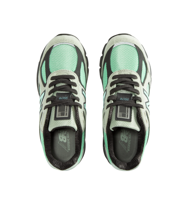 Image 5 of 5 - GREEN - New Balance Unisex Made in USA 990v4 Sneakers feature a timeless performance-inspired silhouette enhanced with premium materials and heritage craftsmanship. Constructed with a breathable mesh upper, suede and synthetic overlays, and a durable NDurance rubber outsole, this iconic style combines comfort and support for everyday wear. ABZORB cushioning at the heel and forefoot absorbs impact through a combination of cushioning and compression resistance, while the ENCAP and C-CAP midsole 