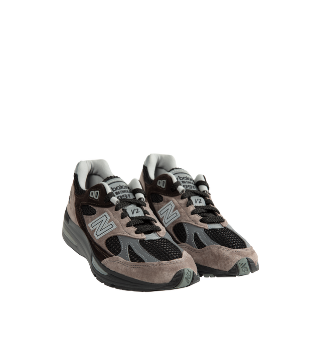 Image 2 of 5 - NEUTRAL - New Balance Unisex Made in UK 991v2 Elevated Neutrals Sneakers is crafted in pigskin suede, mesh, and synthetic materials. Full-length FuelCell cushioning is paired with semi-translucent ABZORB SBS pods and an ENCAP midsole, while reflective details, a debossed "N" logo, and embroidered tongue branding complete the design. Upper: Pigskin Suede, Mesh, and Synthetic Materials. Made in UK. *Unisex style in men's sizing. 