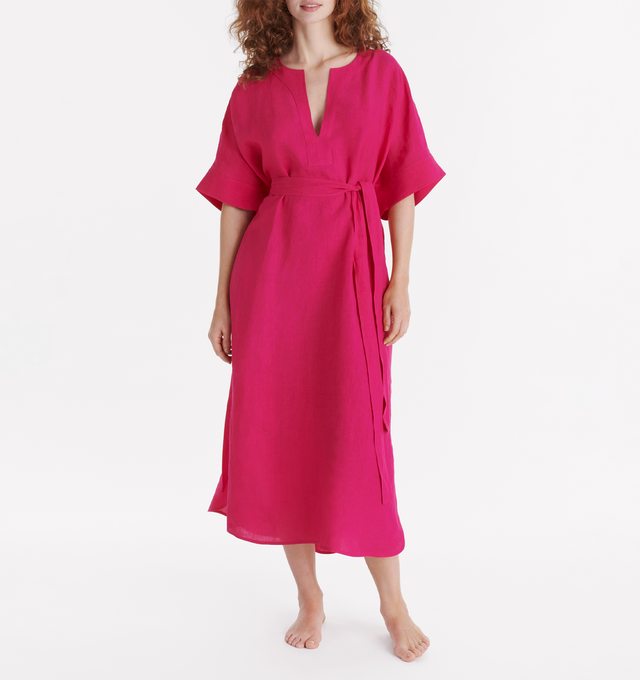 Image 2 of 4 -  PINK - ERES Bibi Kaftan featuring short sleeves, V-neckline, pleated back, removable belt without loop, rounded slits on each side at the bottom and length above ankles. 100% Linen. Made in Bulgaria. 