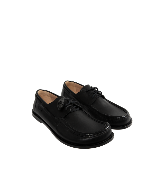 Image 2 of 4 - BLACK - Loewe Men's Campo Boat shoe in soft calfskin featuring the LOEWE signature round toe shape and a hand-sewn construction with a supple leather lining and flexible sole. Features 20mm heel, squared leather lace closure, padded leather insole, rubber-injected leather outsole, removable Flamenco knot and LOEWE embossed tag placed at the side. Made in Italy. 