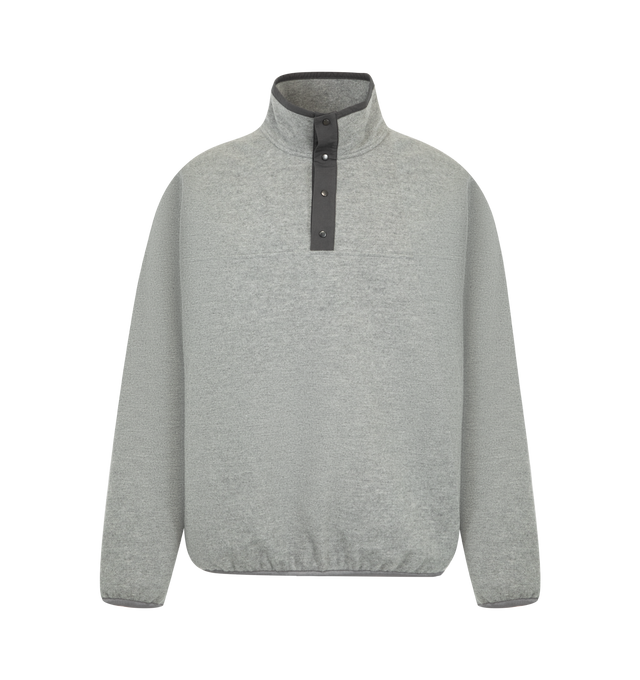Image 1 of 3 - GREY - The Row Men's Maury Sweater is crafted from soft cotton fleece and features a relaxed silhouette with a high-neck collar, long sleeves, and an elasticated hem. Designed with a Henley-style front placket with snap-button closure and discreet side-seam pockets, this designer pullover reflects The Row's refined approach to elevated everyday essentials. Main Material: 100% Cotton. Fit: Relaxed. Closure: Snap-Button Henley Placket. Pockets: Side-Seam Pockets. Made in Italy. 