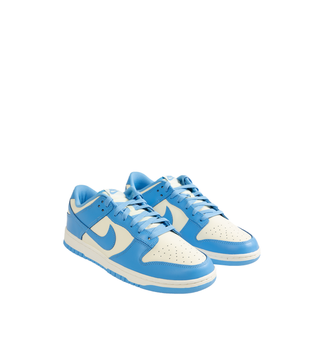 Image 2 of 5 - WHITE - Nike Dunk Low Retro Sneakers are a lace-up style with leather uppers, foam midsoles, padded collars, and rubber outsoles.  