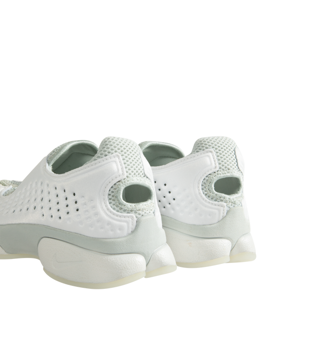 Image 3 of 5 - WHITE - Nike Women's Rift 2 Sneakers feature a padded neoprene and mesh upper with the iconic split-toe construction for a distinctive, sport-inspired silhouette. Designed for easy slip-on wear, these sneakers feature a cushioned footbed, antimicrobial sockliner, fabric lining, and lightweight foam midsole for added comfort. Finished with a durable rubber sole, the Rift 2 combines Nike's signature natural-motion-inspired design with everyday functionality. Upper: Neoprene and Mesh. Lining: Fa 