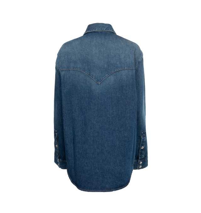 BLUE - KHAITE Jinn Top featuring pointed collar, Western styling at the flap patch pockets, and gleaming snap closures. 80% cotton, 20% recycled cotton.