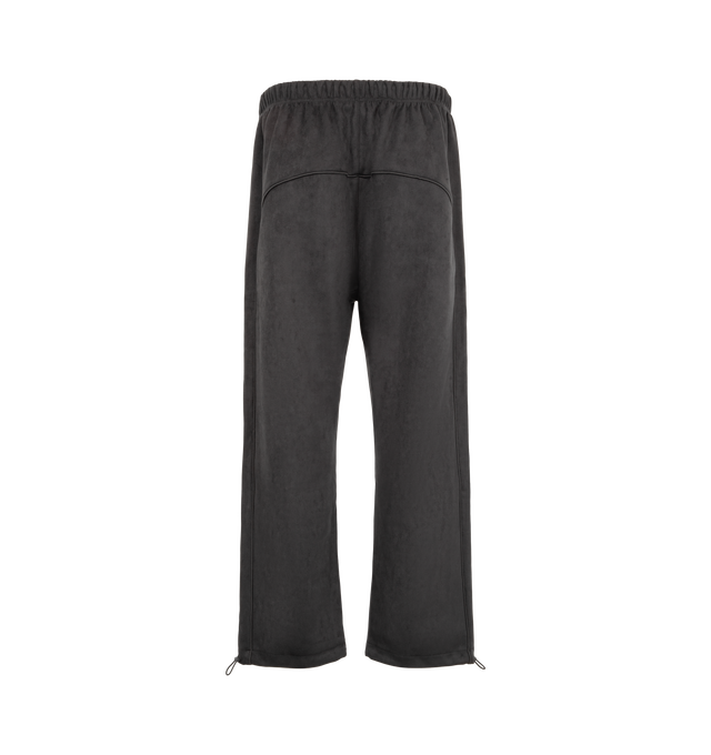 Image 2 of 3 - BLACK - Fear of God ESSENTIALS Men's Signature Relaxed Sweatpant with Piping is crafted from bonded suede fleece and features a relaxed straight-leg silhouette designed for elevated comfort and everyday wear. Accented with sportswear-inspired piping and an embroidered Essentials signature logo at the leg, this premium style is finished with side pockets, adjustable ankle bungees with toggles, an encased elastic waistband with drawstrings, and a signature Essentials label at the center front.  