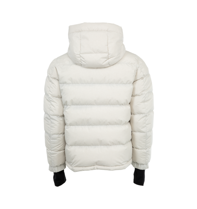 Image 2 of 3 - WHITE - Moncler Grenoble Isorno Jacket has a zip front closure, hood at the back, front zipper pockets, interior snowsuit, thumb holes, and an inner drawcord at the hem to help keep snow and cold out. 100% polyamide. Fill: 9-% goose down, 10% feather. Made in Romania.  