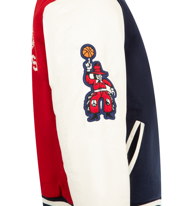 Image 3 of 4 - MULTI - MARKET Old West Varsity Jacket featuring faux leather long sleeves, ribbed neckline, ribbed cuffs and hem, Market brand patches and embroidery, snap-button front closure, side pockets and quilted lining with printed Market graphics. 50% polyester, 50% wool. Sleeves: 100% PU. Lining & filling: 100% polyester. 