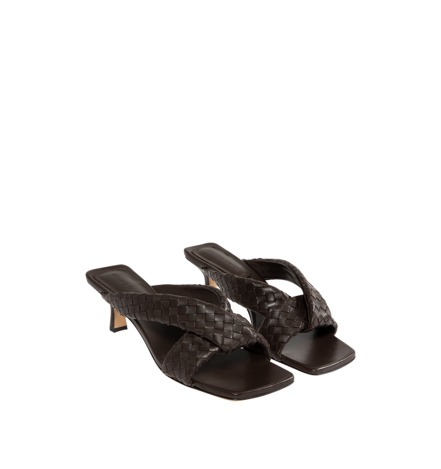 Image 2 of 4 - BLACK - BOTTEGA VENETA Riva Mule featuring kitten heel mule sandal in woven lambskin with padded tubular straps, twisted design and rubber-injected leather outsole. Heel: 2". Lambskin. Made in Italy. 