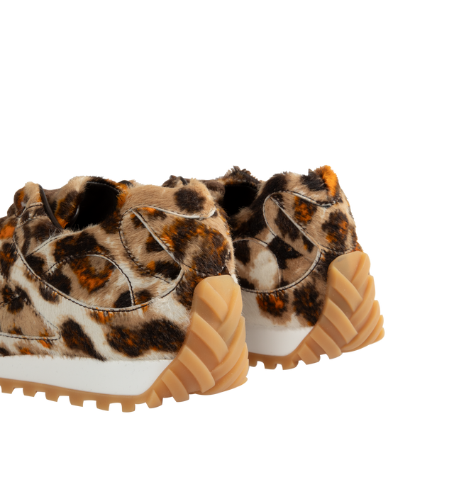 Image 3 of 5 - MULTI - BOTTEGA VENETA Orbit Sneaker in calf hair with jaguar print featuring lace-up front and gripped soles. Rubber outsole. Made in Italy. 