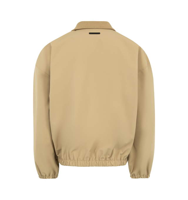 Image 2 of 3 - BROWN - FEAR OF GOD ESSENTIALS Signature Full Zip Track Jacket featuring stretch nylon taffeta, rib-knit stand collar, zip closure, logo embroidered at chest, seam pockets at waist, elasticized hem and cuffs, rubberized logo patch at back collar and full mesh lining. 90% nylon, 10% spandex. 