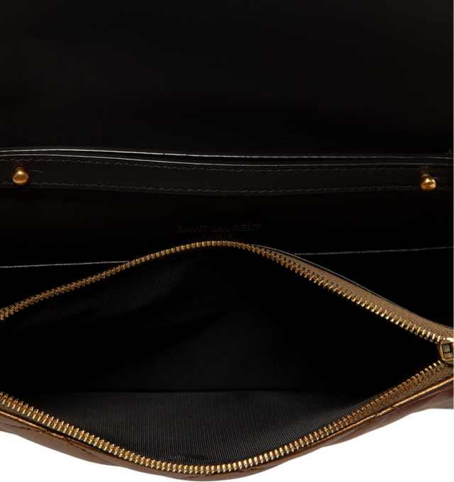 Image 3 of 4 - GOLD - Saint Laurent Women's Envelope Small YSL Wallet on Chain is crafted from metallic leather and features the house's iconic chevron quilting, a signature Cassandre logo, and a detachable leather-and-chain shoulder strap for versatile styling. This designer wallet on chain combines timeless elegance with everyday functionality, offering an envelope flap with snap closure, an interior zip pocket, and a slip pocket for organized essentials. Main Material: Metallic Leather. Hardware: Metal.  