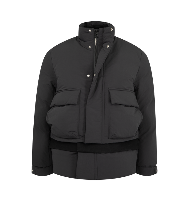 Image 4 of 5 - BLACK - Sacai Men's Double Padded Jacket with Zip Closure is crafted from polyester and features an oversized hybrid silhouette that combines elements of a jacket and coat. Designed with a concealed zip closure beneath a buttoned placket, a layered lower section with button fastening, front patch pockets, and ribbed elasticated cuffs for a functional yet refined finish. Main Material: 100% Polyester. 