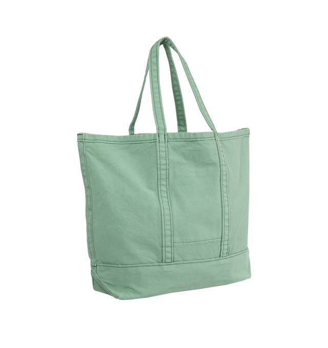 Image 2 of 3 - GREEN - HUMAN MADE Garment Dyed Tote Bag featuring panelled design, embroidered logo to the front, two top handles, main compartment, open top and square body. 100% fabric. 