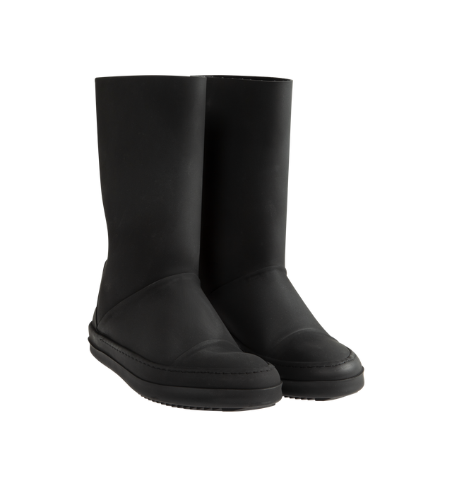 Image 2 of 4 - BLACK - Rick Owens DRKSHDW Sneakwaders are crafted from certified recycled thermoplastic polyurethane and feature a mid-calf silhouette inspired by wader boots. This distinctive design combines a tubular pull-on upper with a classic sneaker-inspired foot, complete with toe caps and signature shark-tooth soles. Developed using certified recycled thermoplastic materials, the construction supports reduced water consumption, emissions, and hazardous waste while lessening reliance on non-renewable 