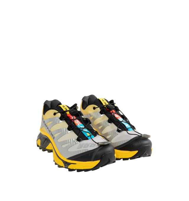 Image 2 of 5 - YELLOW - Salomon Men's XT-4 OG Sneakers are crafted with a lightweight textile and synthetic upper and feature the brand's Agile Chassis System, Quicklace technology, and dual-density EVA cushioning for exceptional stability and comfort. Reviving one of Salomon's iconic trail-running silhouettes, these designer sneakers combine technical performance with archival outdoor style, delivering superior support, durability, and all-terrain traction for both city streets and rugged trails. Main Mate 