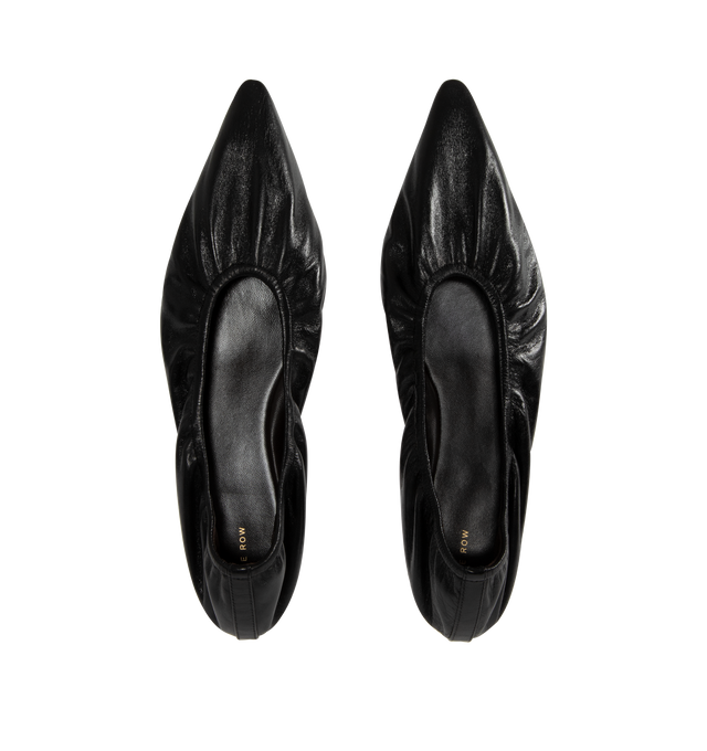Image 4 of 4 - BLACK - THE ROW Liisa Flat Shoe featuring minimal flat shoe in soft lambskin leather with pointed toe, soft elastic trim, and leather sole. 100% lambskin leather. Leather sole. Made in Italy. 
