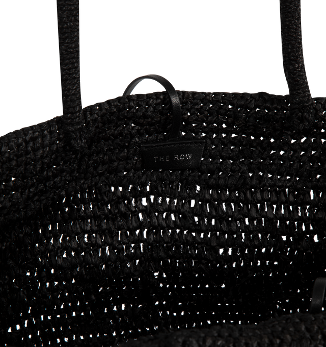 Image 3 of 3 - BLACK - THE ROW Oregon Bag featuring natural raffia with integrated shoulder straps, dimensional texture and removable leather pouch. 100% raffia. 17" W x 13.25" H x 11". Made in Italy. 