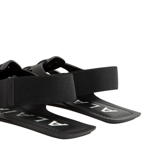 Image 3 of 4 - BLACK - ALAIA Folded Flat Calfskin Sandals featuring semi open flat sandals playing on folding work of leather and elastic strap behind the ankle. 100% calf leather. Made in Italy. 