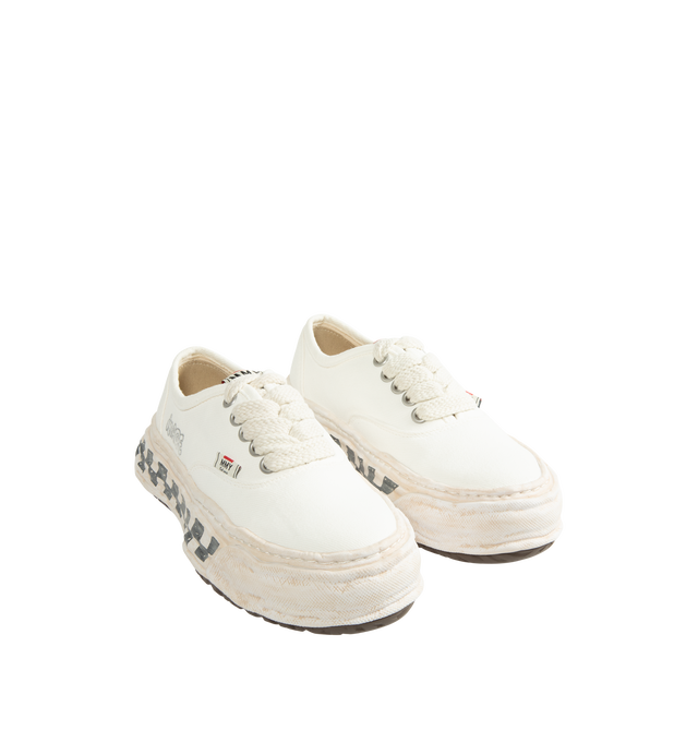 Image 2 of 5 - WHITE - Maison Mihara Yasuhiro Men's Baker26 Graffiti Sole Low-Top Sneakers feature the brand's signature OG sole with graphic details, a graffiti-printed canvas upper, and a bold low-top silhouette for a contemporary statement look. Main Material: 100% Cotton Upper. Sole: Rubber. 