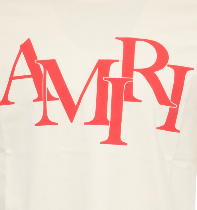 Image 2 of 2 - WHITE - AMIRI Staggered Logo T-Shirt featuring logo print at chest, crew neckline, short sleeves and pullover style. 100% cotton. Made in Italy. 