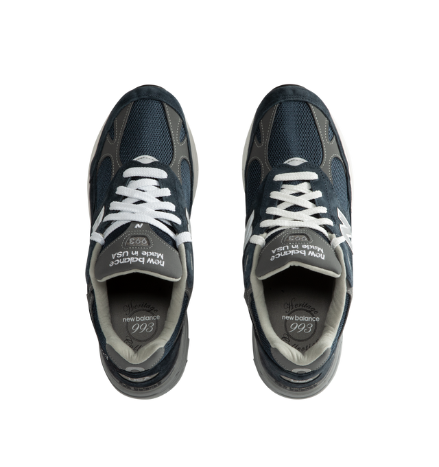 Image 5 of 5 - BLUE - New Balance Men's Made in USA 993 Sneakers feature a mesh upper with premium suede overlays and reflective accents. ABZORB midsole cushioning combines impact absorption with compression resistance, while ACTEVA cushioning provides flexible support. A full-length rubber outsole is finished with Ndurance rubber at the heel for added durability. Upper: Mesh and Pig Suede. Sole: Rubber. Made in USA. 
