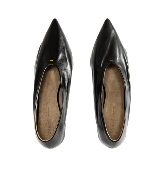 Image 4 of 4 - BLACK - Khaite pump inspired by the soft folds of fabric and crafted in Italy of glazed calfskin selected for its luminous shine. The deconstructed upper is lined in cigar-hued suede, accentuating a natural fit that moves with the foot. Detailed with signature gold staple. 2" high heel. Glazed calf (100% calfskin). Made in Italy. 