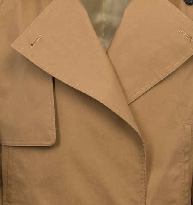 Image 3 of 4 - BROWN - KHAITE Hammond Jacket featuring cropped fit, moto accents, oversized fit, belted hem and cuffs with chrome buckles and classic trench details. 69% cotton, 31% polyamide. 