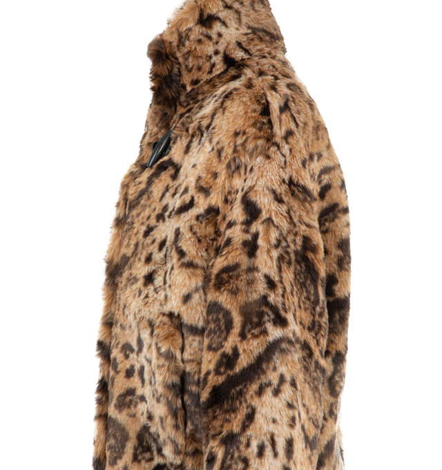Image 3 of 3 - BROWN - Jacquemus Women's Le Blouson Fernando Jacket is crafted from faux leopard fur and features an oversized silhouette with rounded shoulders, a stand collar, and a fully lined interior. Designed with an asymmetric front closure secured by a toggle and leather loop fastener, this statement outerwear style is finished with hidden snap buttons, side welt pockets, and a signature Jacquemus Rosemary label at the back. Main Material: 62% Polyacrylic, 23% Modacrylic, 15% Polyester. Lining: 52%  