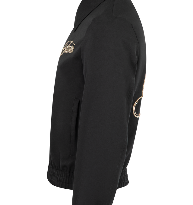 Image 3 of 3 - BLACK - AMIRI Club Amiri Jacket featuring polyester satin, crystal-embellished Club Amiri script on the chest and back, point collar, full-zip front, branded zip pulls, side slip pockets, long sleeves and ribbed cuffs and hem. Polyester/wool. Made in Italy. 