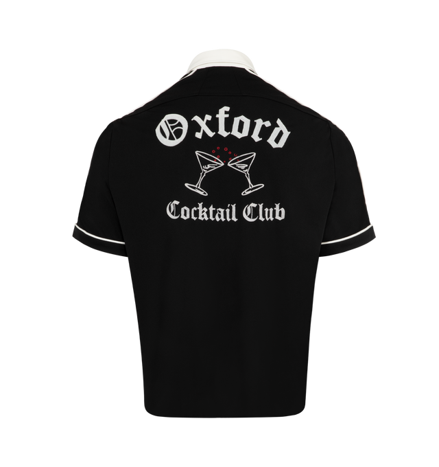 Image 2 of 2 - BLACK - RHUDE Oxford Cocktail Club Bowling Shirt featuring front button fastening, contrasting spread collar, contrasting trim, logo print at the chest, two front patch pockets, short sleeves, slogan print to the rear, short side slits and straight hem. 100% polyester. 