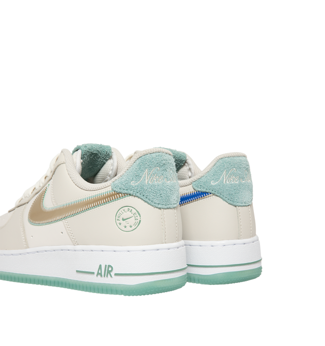 Image 3 of 5 - NEUTRAL - Nike Men Air Force 1 '07 "Easter" Sneaker featuring classic silhouette with leather for a crisp, clean look, genuine leather upper with perforated toe box, Nike Air unit, rubber outsole with classic pivot circles and padded collar. 