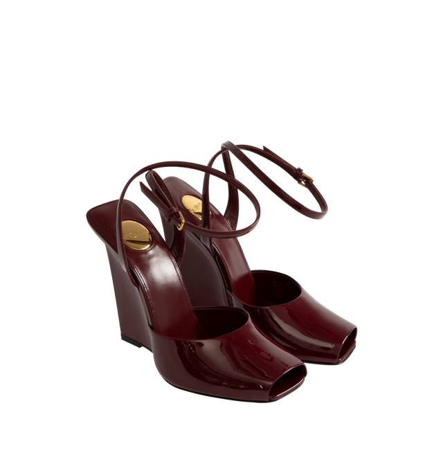 Image 2 of 4 - RED - Saint Laurent wedge sandals with a square open toe and covered heel, featuring an adjustable ankle strap, leather sole, round saint laurent-engraved metal plaque on the insole. Heel height 11 cm / 4.3 inches. Calfskin leather. Made in Italy. 