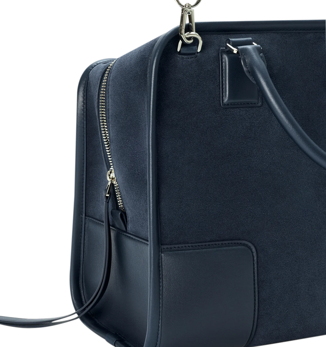 Image 15 of 16 - NAVY - Loewe Large Amazona 180 Bag in suede featuring a relaxed silhouette anchored by a single toron top handle, designed to be carried open while a concealed closure secures the main compartment, removable shoulder and crossbody straps, zip closure with two leather zip pullers, two compartments, main compartment closed with magnetic closure, internal flat pocket, left side d-ring for customization, suede and nappa lambskin lining, embossed LOEWE and embossed double L branding. Suede/calf. 