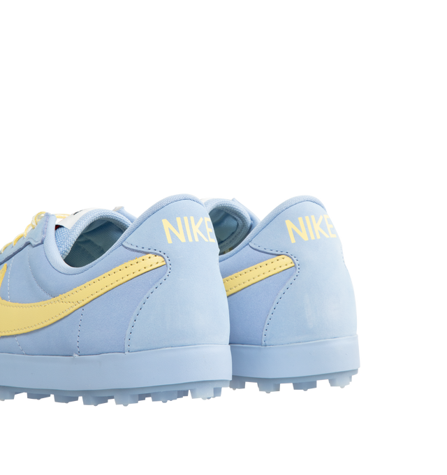 Image 3 of 5 - BLUE - NIKE Astrograbber Sneaker featuring an American football shoe with a leather upper, padded, low-cut collar, tonal rubber midsole and waffle outsole. 