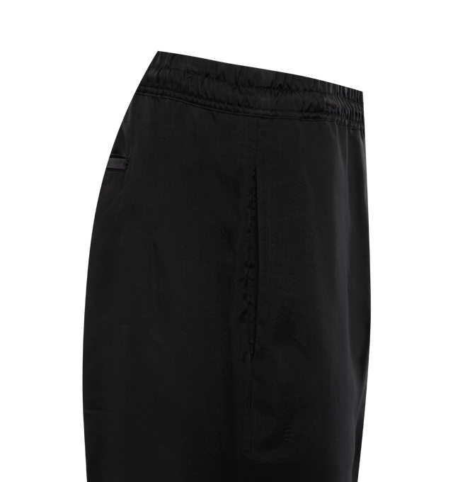 Image 3 of 3 - BLACK - SAINT LAURENT Relaxed Pants featuring low rise, relaxed fit, wide leg, elastic waist, faux fly, concealed side pockets, one welt pocket at back and embossed label. 100% cupro. 
