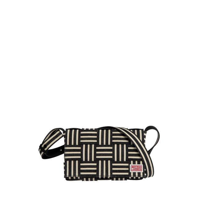 NAVY - BOTTEGA Cassette Handbag featuring medium intreccio crossbody bag, Bottega Veneta tab on the front, single interior zipped pocket and magnetic closure. 5.9" x 9.1" x 2". Strap drop: 20.5". 100% cotton. Made in Italy.