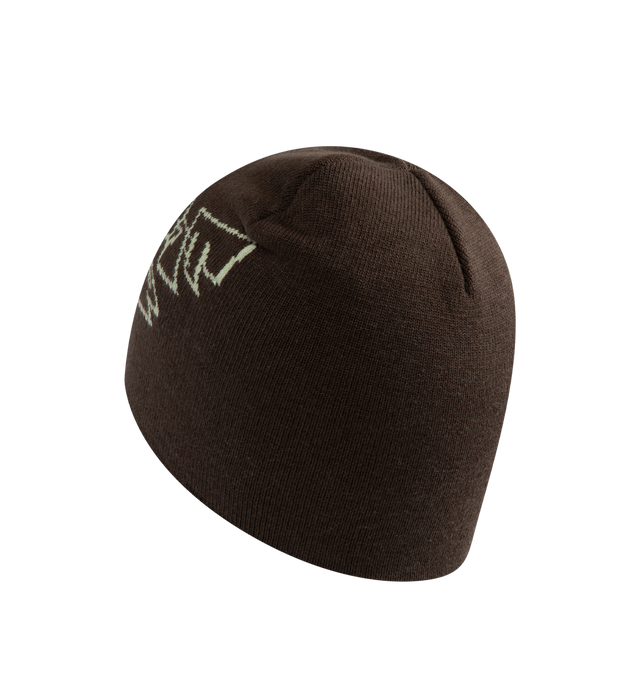 Image 2 of 2 - BROWN - CARHARTT WIP Screwed Up Scripter Beanie featuring stretchable, cotton-rich yarn with a graphic jacquard design on the front. 48% cotton, 47% acrylic, 4% nylon, 1% elastane (9 gauge). 